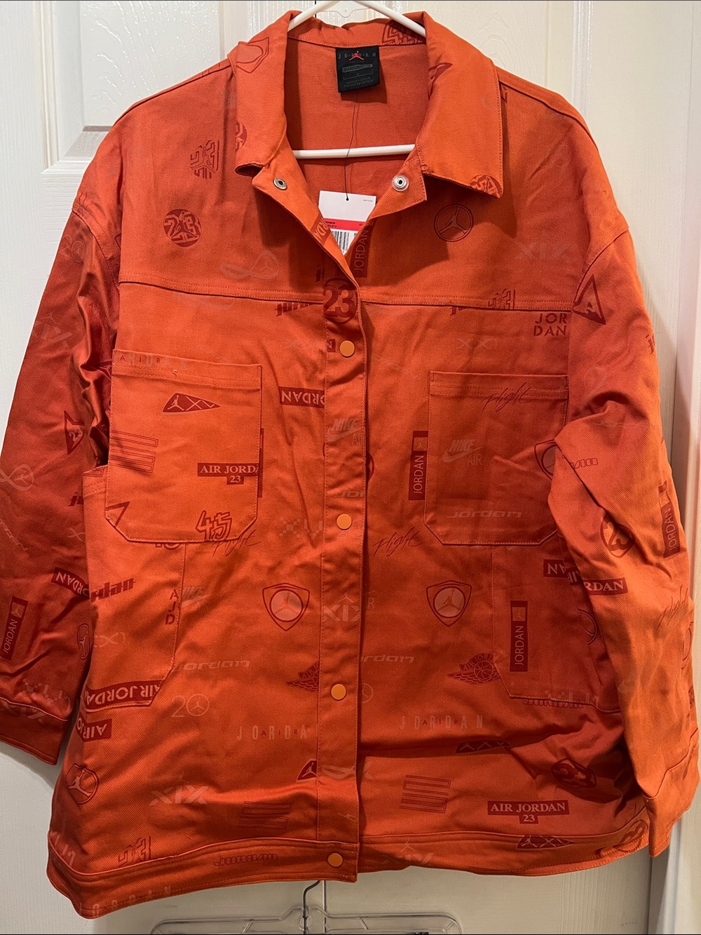 Rare Jordan Orange Oversized Utility Jacket with fun Air Jordan Logos NWT
